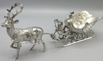 Continental silver model of a Rococo Sleigh on scroll supports, pulled by a Reindeer, stamped