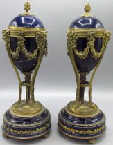 Pair of Louis XVI style ormolu mounted blue porcelain casolettes, egg shaped bodies with