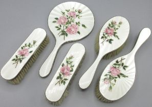Elizabeth 11 silver and enamel five piece dressing table brush and mirror set, decorated with pink