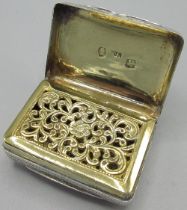 George 1V silver rectangular vinaigrette, engraved with foliage, lid with vacant cartouche, gilt