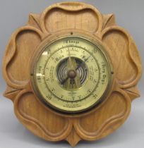 Shortland Smiths Aneroid barometer in Yorkshire Rose carved oak surround, D20cm