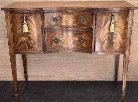 Small Regency style mahogany inverted bow breakfront sideboard with two drawers and two cupboards,