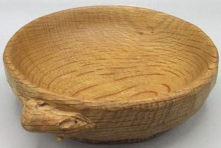 Robert Mouseman Thompson of Kilburn - an oak circular nut bowl, carved with signature mouse, D15.5cm