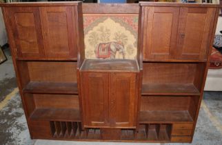 Edwardian oak stationery cabinet, with four cupboards, six drawers and twelve compartments, W150cm