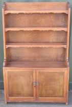 C20th Turner & Sons of Staffordshire oak dresser, three tier back above two panel doors, W96cm