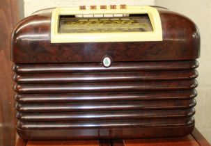 Circa 1930s Bush radio. Original Bakelite casing with buttons and dials in tact. Serial number to