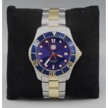 Tag Heuer Aquaracer stainless steel and gold plated quartz wristwatch with date on matching