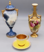 Royal Worcester: ovoid urn and cover painted in blue and gilt with castle and hillside scene, signed