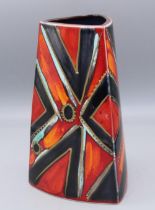Anita Harris art pottery, triangular vase, decorated in blue, orange and gold on red ground, H22cm