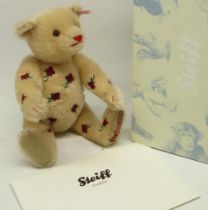 Steiff: 'Musical Bear "Jerusalem"', blonde mohair with embroidered roses, limited edition of 2000,