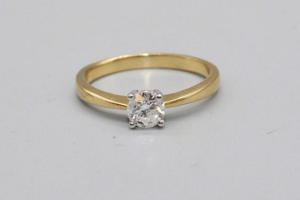 18ct yellow gold diamond solitaire ring set with single diamond, approx. weight 0.34ct, stamped 750,