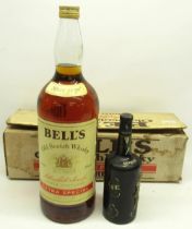 Ferreira 06400 1960 vintage port, unopened, and a gallon bottle of Bells old scotch whiskey