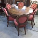 Victorian breakfast table, circular rosewood tilt top marquetry decorated with scrolls and