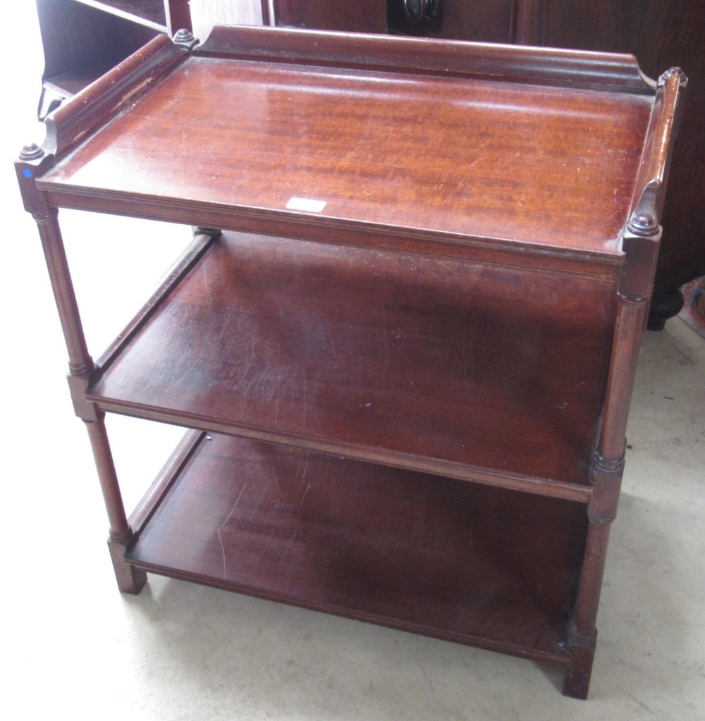 C20th mahogany three tier buffet, galleried top on turned supports, W70cm D42cm H74cm