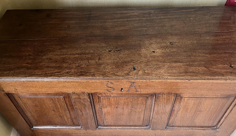 George III oak coffer, hinged plank top with moulded edge above four fielded panel front, carved - Image 3 of 3