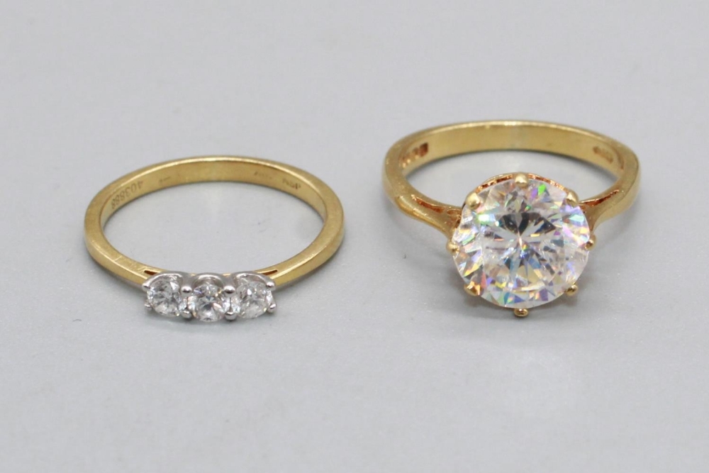 18ct yellow gold ring set with large clear stone, stamped 18, size J1/2, 3.6g, and a yellow metal - Image 2 of 3