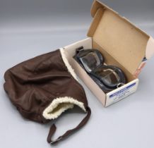 Late C20th sheepskin lined driving hat, and a pair of Halcyon Mark 8 motorcycle goggles (2)