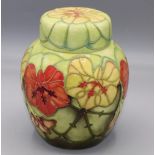 Moorcroft Pottery: 'Nasturtium' pattern ginger jar designed by Sally Tuffin for M.C.C., orange and