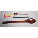 Large carved yew spoon, Irish black oak fishing priest and a Sailmakers needle, L47cm max (3)