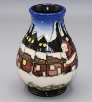Moorcroft Pottery: 'Christmas in the Pots' vase designed by Vicky Lovatt, Father Christmas on snow