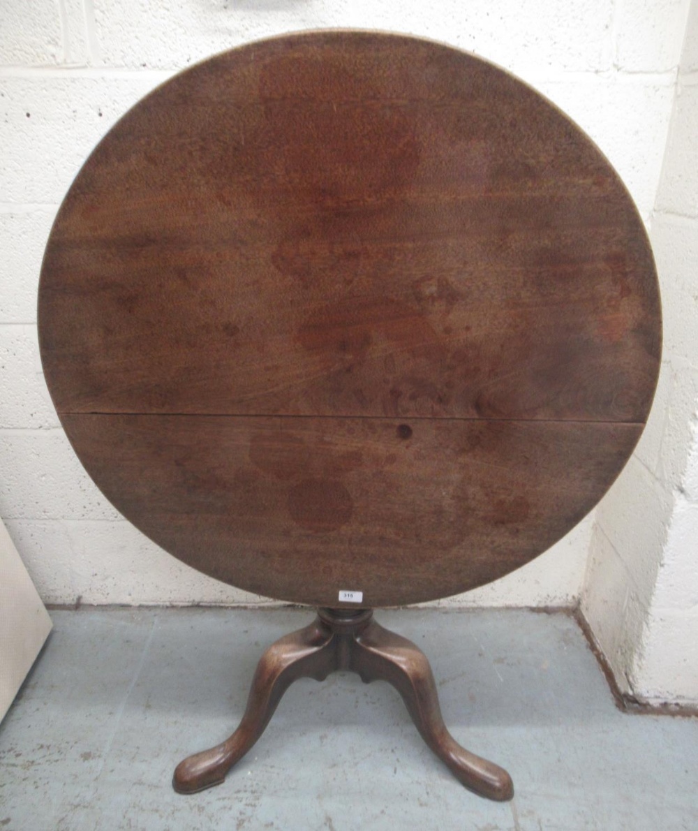 Geo. III mahogany tripod tea table, circular snap top on gun barrel turned column with cabriole