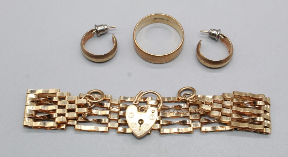 9ct yellow gold five bar gate bracelet with heart padlock and safety chain, stamped 375, 9ct