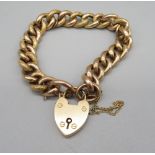 9ct yellow gold texture link bracelet, stamped 9c, with heart padlock clasp stamped 15c, 25.2g