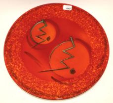 Anita Harris art pottery, charger in red and orange glaze with abstract design, D42cm