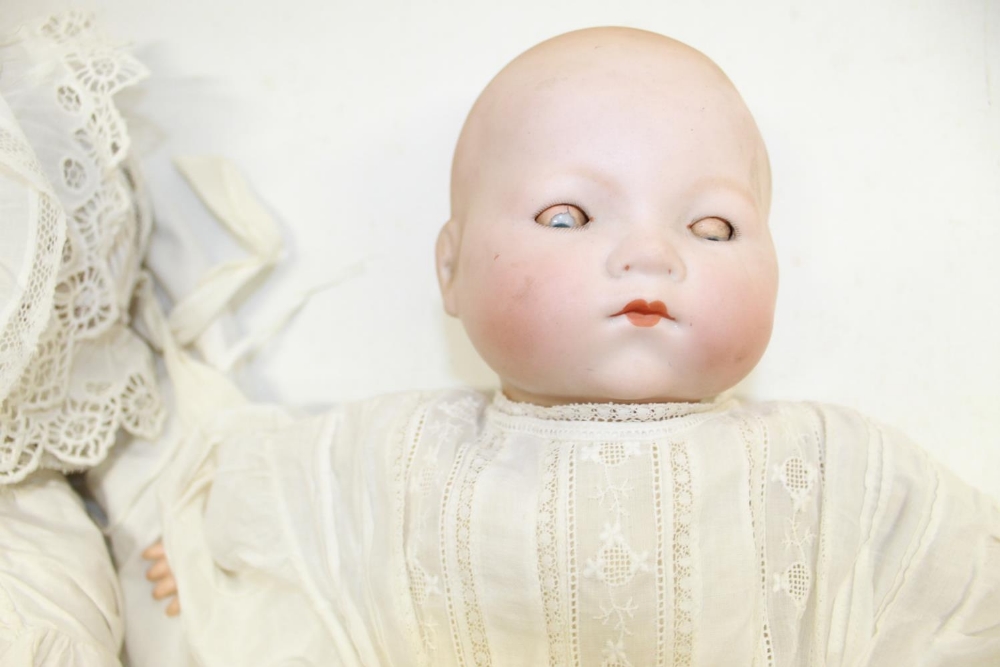 Two early 20th century bisque head baby dolls: crying doll marked Simon and Halbig 126, white gown - Image 3 of 3