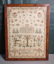 William IV needlework sampler on linen, worked in colours with flowers Angels Adam & Eve, and