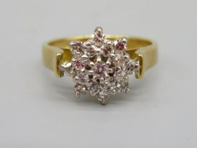 18ct yellow gold diamond cluster ring stamped 750, size I1/2, 3.7g