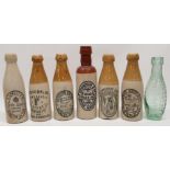 Collection of 20th century five stoneware ginger beer and stout bottles, various North East