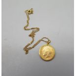 Geo.V 1914 half sovereign in 9ct yellow gold mount, stamped 375, on 9ct gold chain, stamped 9ct, 6.