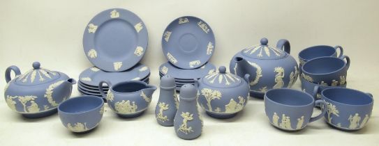 Wedgwood blue Jasperware teaware, incl., two teapots, cups and saucers, sugar bowl with cover,