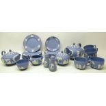 Wedgwood blue Jasperware teaware, incl., two teapots, cups and saucers, sugar bowl with cover,