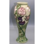 Moorcroft Pottery: 'Sweet Pea' vase designed by Sally Tuffin for M.C.C. c1992, pink and purple