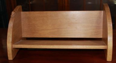 Robert Mouseman Thompson of Kilburn - an oak book trough, single shelf with shaped ends, carved with