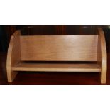 Robert Mouseman Thompson of Kilburn - an oak book trough, single shelf with shaped ends, carved with