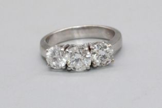 WITHDRAWN - 18ct white gold three stone diamond and moissanite ring, set with one brilliant cut di