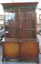 Victorian mahogany bookcase, glazed top with three shelves, base with two doors on bracket feet,