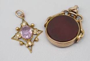 Edwardian 9ct yellow gold pendant set with seed pearls and central amethyst, stamped 9ct, 9ct yellow