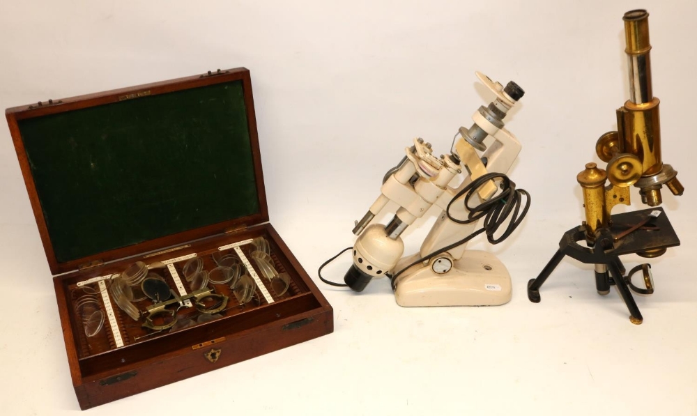 J. Swift & Son lacquered brass monocular microscope with rotating three lens objective section