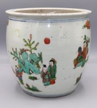 20th century Chinese famille verte cache pot decorated with figures in a garden, four character