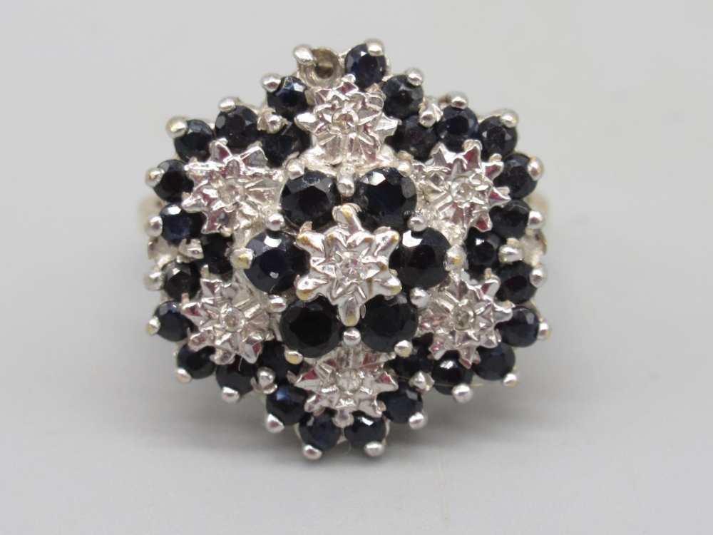 9ct yellow gold diamond and sapphire floral ring, stamped 375, size Q1/2, 4.7g