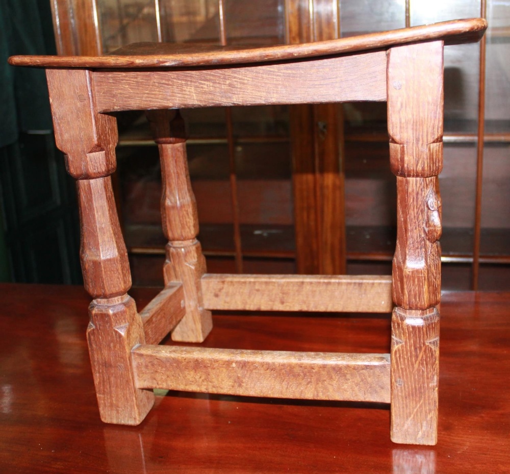 Robert Mouseman Thompson of Kilburn - an oak joint type stool, nailed rectangular adzed dished top