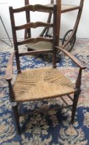 Early C20th childs rush seated ladderback armchair with inlaid detail, H71cm max