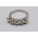 18ct five stone diamond ring, each brilliant cut diamond in diamond set claw mounts, total diamond