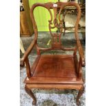 C20th Chinese hardwood armchair with solid seat and carved detail