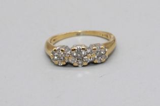 18ct yellow gold ring set with three diamond clusters, stamped 18, K1/2, 3.0g