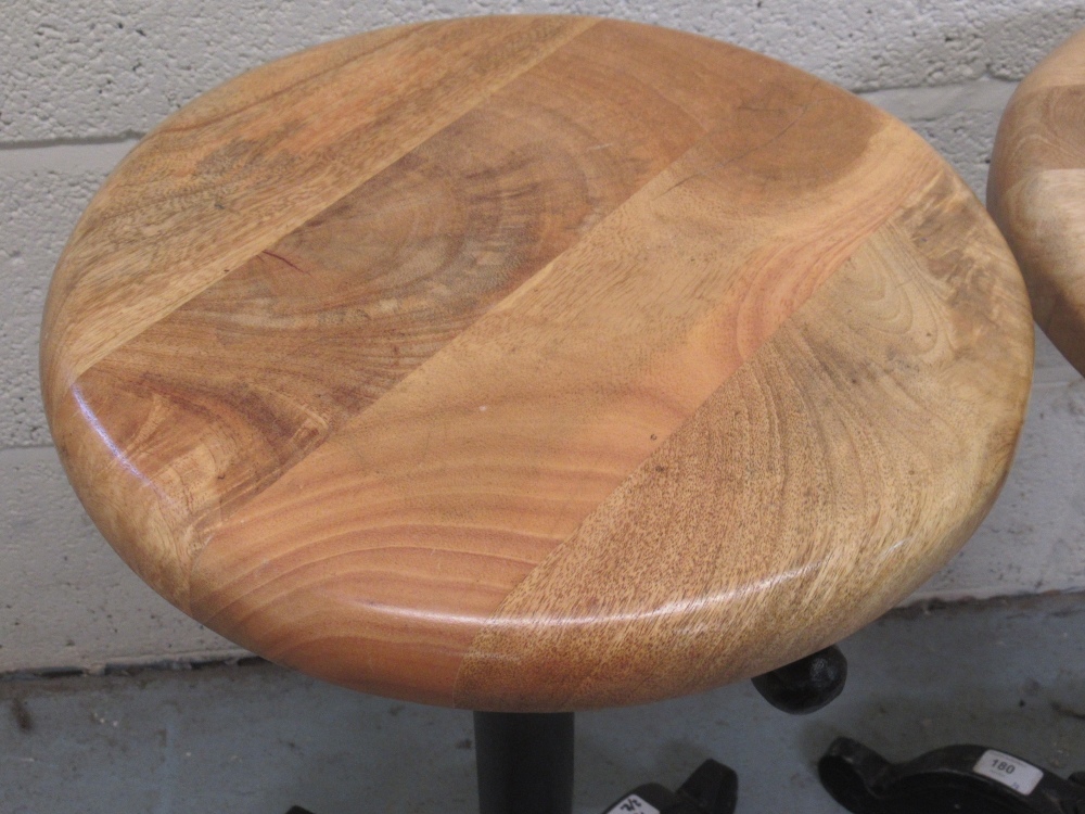 C20th pair of cast iron machinist type stools with circular beech height adjustable seats, minimum - Image 3 of 3